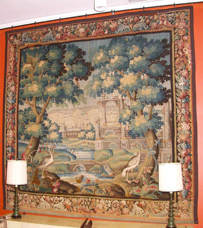 Flemish portico garden tapestry,Flandres 17th Century

Flandres-dutch
circa 1650
this extraordinary tapestry is Woven with two large birds(cranes)standing on rocks of a garden
with various horizontal architectural neoclassic ruines and