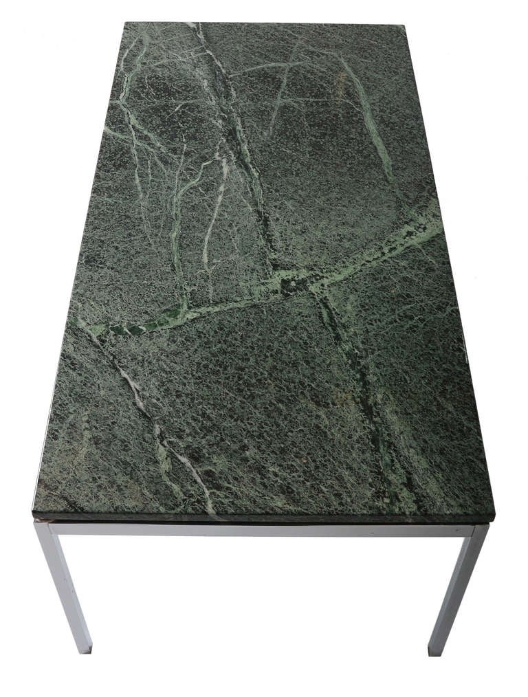 A unique Florence Knoll coffee table in polished stainless with a Verde Alpi green marble top .
This marble is not available any longer through Knoll.

An outstanding iconic piece.
