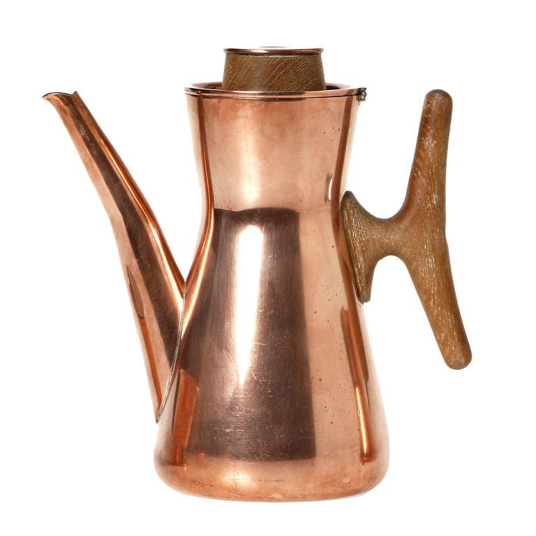 A great Tapio Wirkkala coffee set for Kultakeskus Oy, Finland.
These sets were special ordered and are rather rare.
Solid copper with silver plated interior.   
Sculpted handle and top with a brass top.

Stamped with makers marks and Tapio