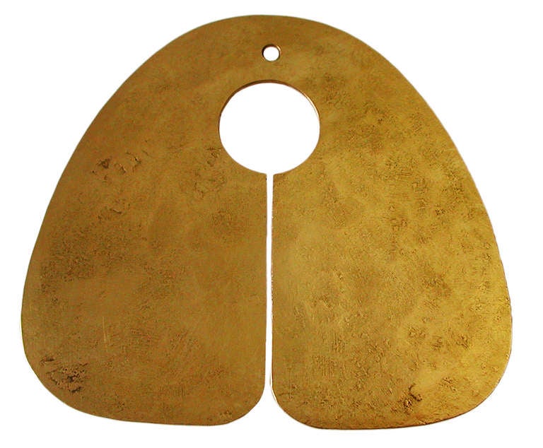 An extraordinary masterpiece of Twentieth Century Design.

A solid 18K gold Gong Pendant.    Only a few examples of the solid silver pieces were ever made for Family and friends.  This is the only known example of a solid gold piece.  This was