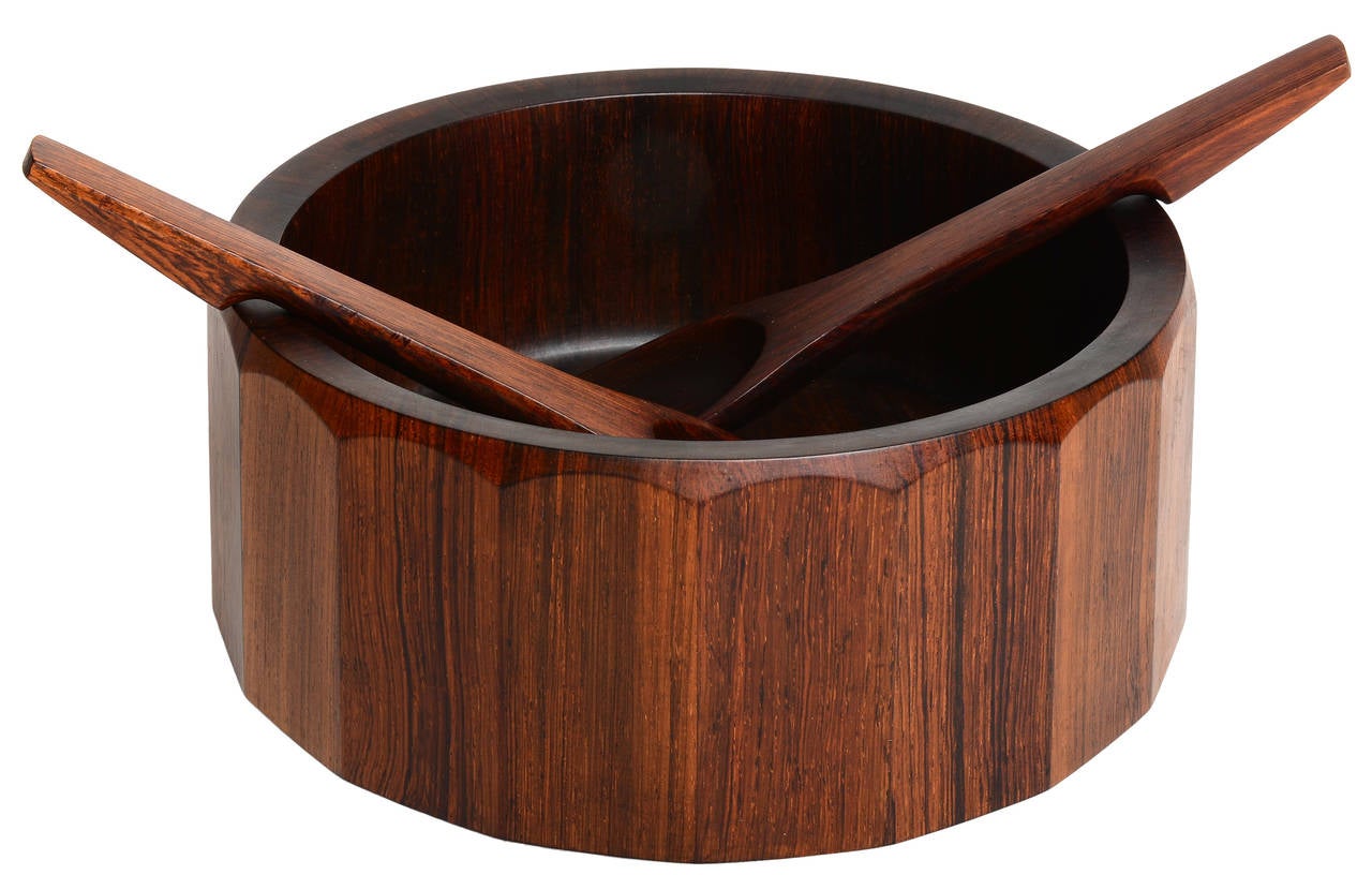 A terrific example of a Palisander salad bowl with matching tongs by Jens Quistgaard for Dansk.   A part of the Rare Woods Series from the 1960's.