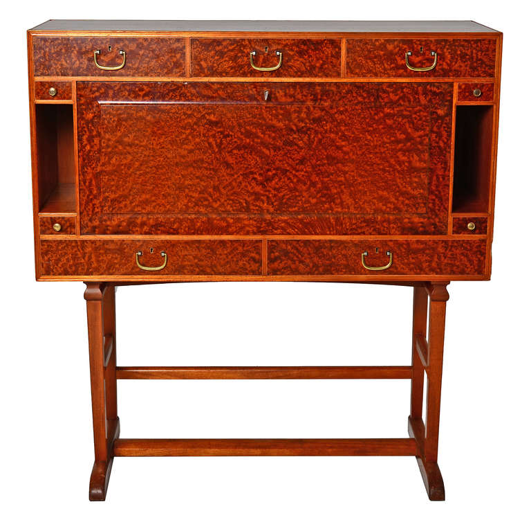 A spectacular piece by Josef Frank for Svenskt Tenn.

Nine drawers and one drop down central door that reveals 4 drawers , cubbys and pigeon holes for notes, papers...

Quality throughout with Rosewood, maple burl ,mahogany, and birch.
Original