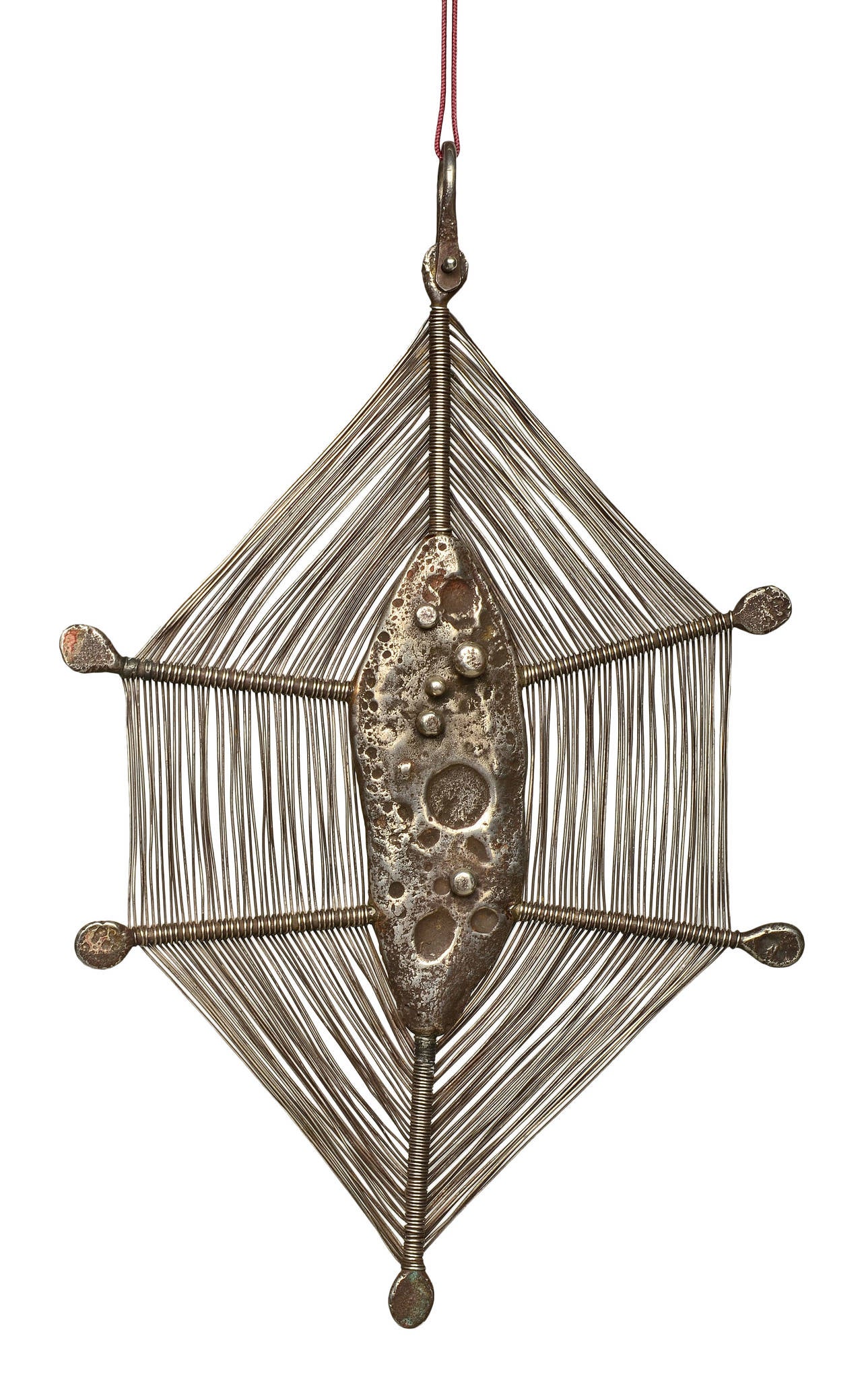 A truly spectacular early masterpiece by Harry Bertoia.
An artist created jewelry form which hints at later metal sculptures.

This web form pendant was crafted in the 1940s while Harry was at Cranbrook.

Unique in form and design. 
Thin