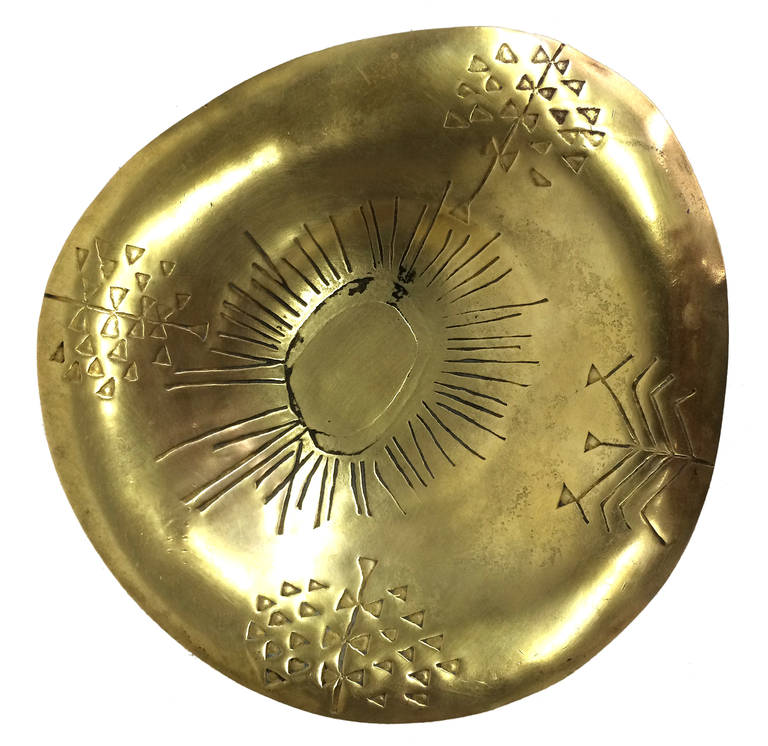 An unusual small bowl in solid brass by Tapio Wirkkala.
These bowls were made in very limited numbers. Hand made and stamped.