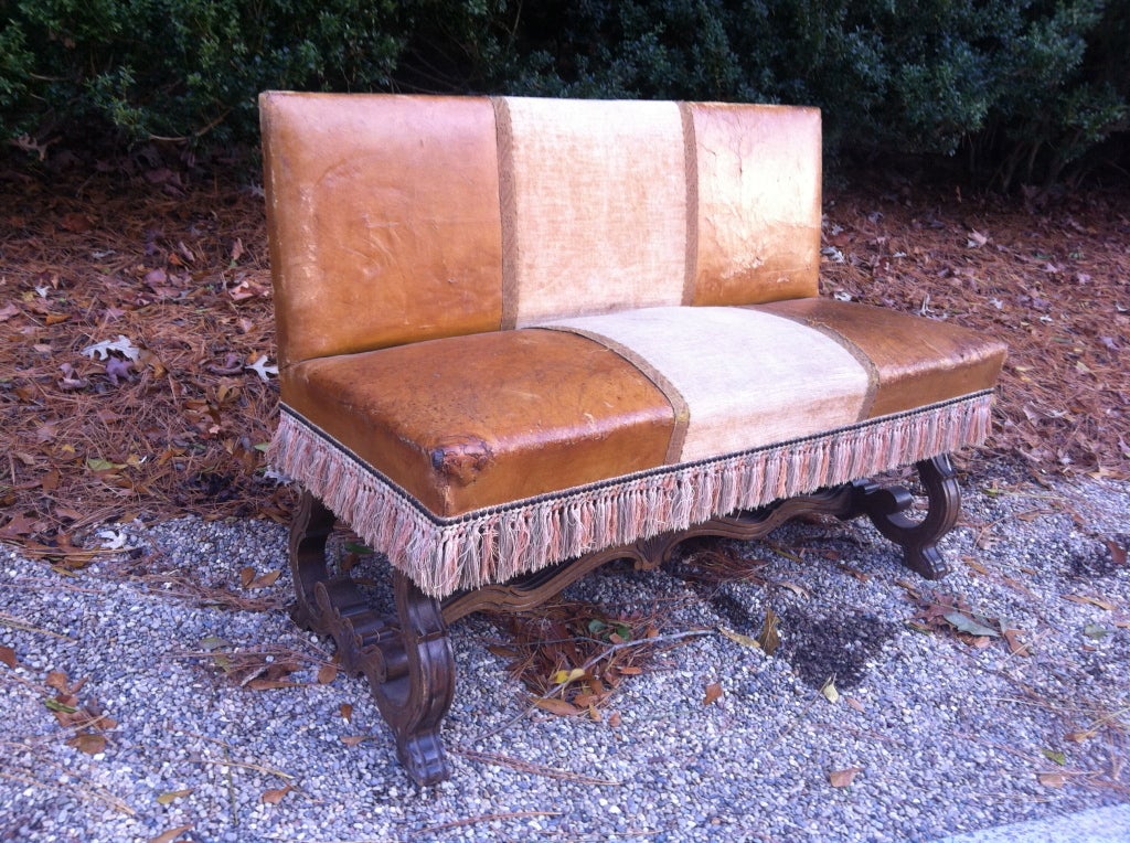 Unusual Leather and Velvet French Settee with Beautifully carved Walnut legs and original tassel fringe