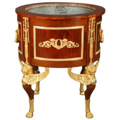 A rare French early 19th century ormolu-mounted mahogany jardiniere 