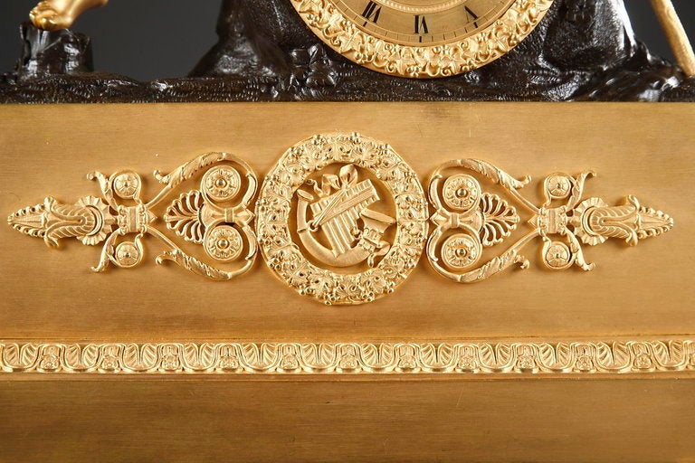 Bronze figural mantel clock with a shepherd playing the flute signed Otran Fils