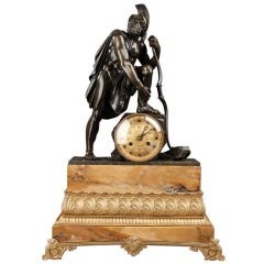 Gilt and patinated bronze mantel clock on Siena marble base with a Roman warrior