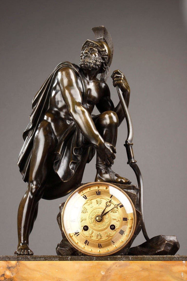 Gilt and patinated bronze mantel clock on Siena marble base with a Roman warrior