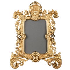 Louis XV style gilt bronze frame with mascaron and foliage