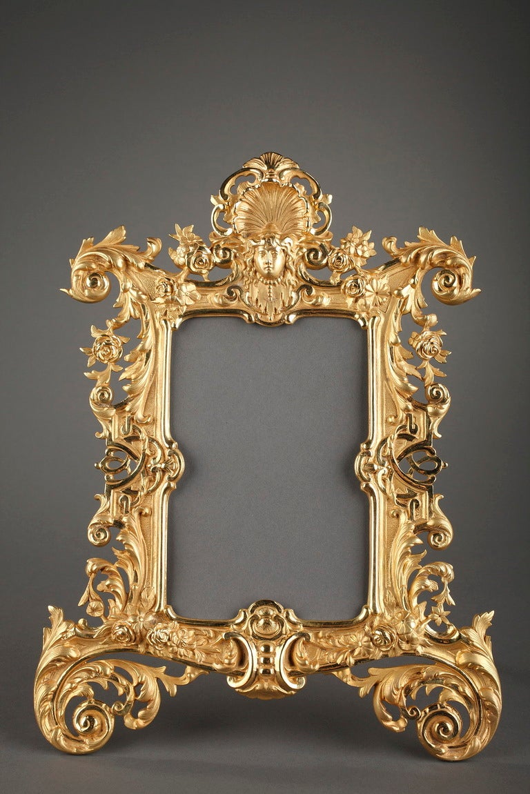French Louis XV style gilt bronze frame with mascaron and foliage For Sale