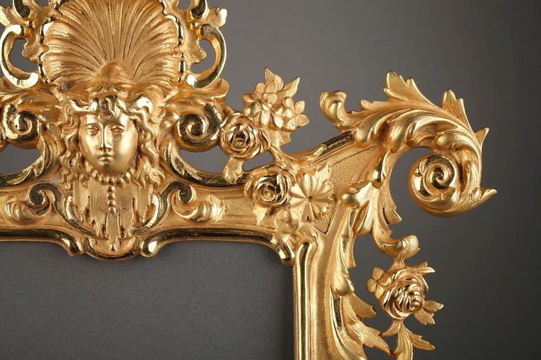 Ormolu Louis XV style gilt bronze frame with mascaron and foliage For Sale