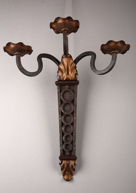 A pair of large wrought iron Art Deco sconces