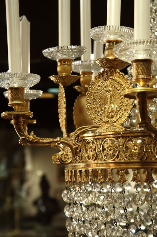 Ormolu A French First Empire crystal and ormolu peacock decorated chandelier For Sale