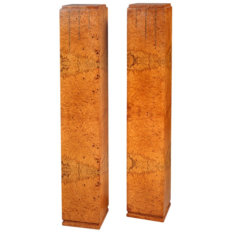 A French Art Deco pair of elm burr high stands For Sale