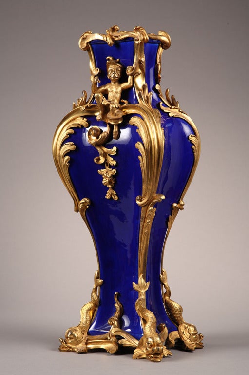 French A pair of Louis XV style ormolu mounted blue porcelain vases For Sale