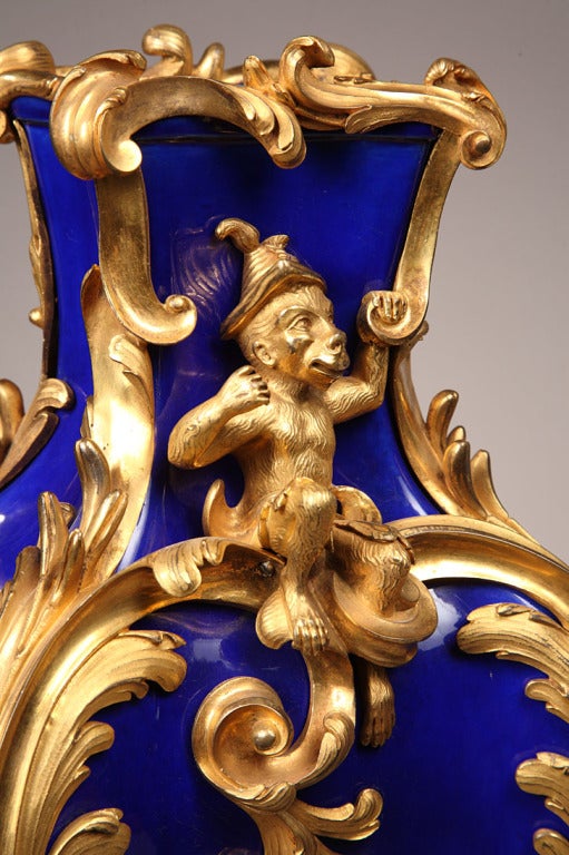 A pair of Louis XV style ormolu mounted blue porcelain vases For Sale 1