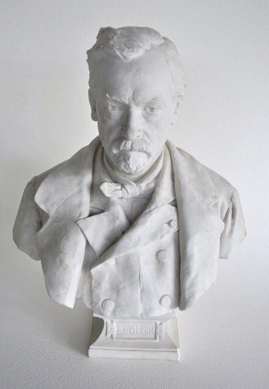 A stunning Sevres biscuit bust of Louis Pasteur. Dated 1921, incised cypher AD, impressed rectangular mark S/1921/PN at the back
realistically modelled looking straight ahead and wearing a waistcoat with the order of the Legion of Honour on his