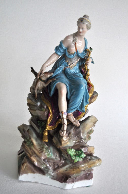 A wonderful glazed porcelain figure of Diana with crossed blue sword Meissen mark on bottom. Strong crisp color and form with very minor losses.