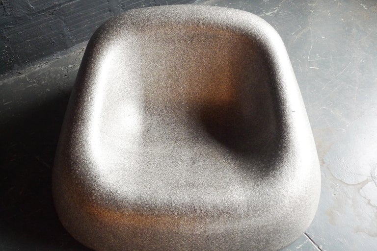 Welsh-born designer and architect Ross Lovegrove is known for smooth organic forms, and the Air One chair is no exception. Made of pressed foam in a waffle structure and stackable, the chair is exceedingly light and durable. Produced very briefly