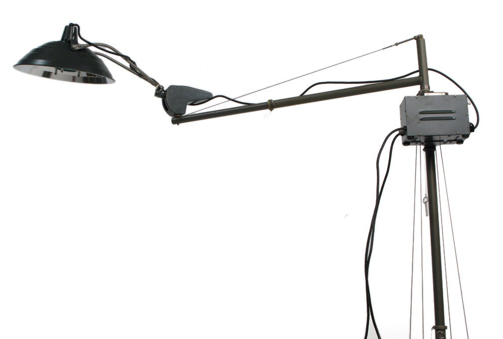 This is one of the most unusual pieces we have seen come through the doors here at the Good Mod. This 7ft tall floating arm military surgical lamp collapses into a portable case which doubles as the lamp stand. The portable design allowed for the