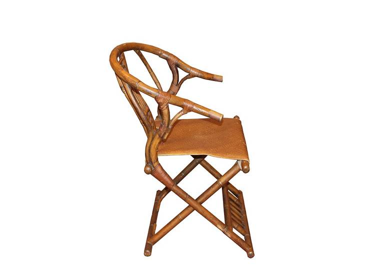 oriental horseshoe rattan chair, folding.