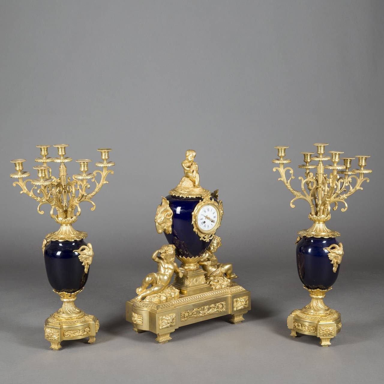 Porcelain and Gilt Bronze Three-Piece Clock Garniture, 19th Century For Sale 5