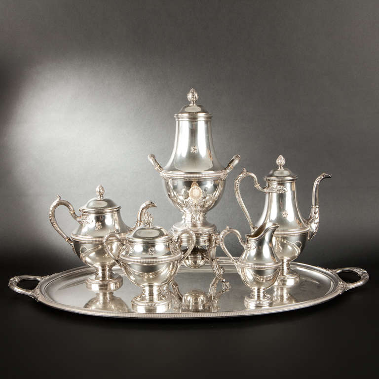 Robert Linzeler, silver tea and coffee service, circa 1900

Important silver, silver-gilt and ivory tea and coffee service, initialed CGS with decoration of blooming pomegranates, waterleaves, acanthus leaves, ribbon-tied reeds and