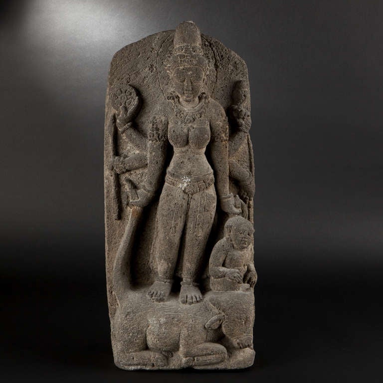 Stele of Durga Mahishasuramardini. Indonesia, 13th-14th Century

Volcanic tuff stone (andesite) stele of Durga Mahishasuramardini. Sculpture representing the grand goddess with six arms, of Durga Mahishasuramardini, Destroyer of demon asura in