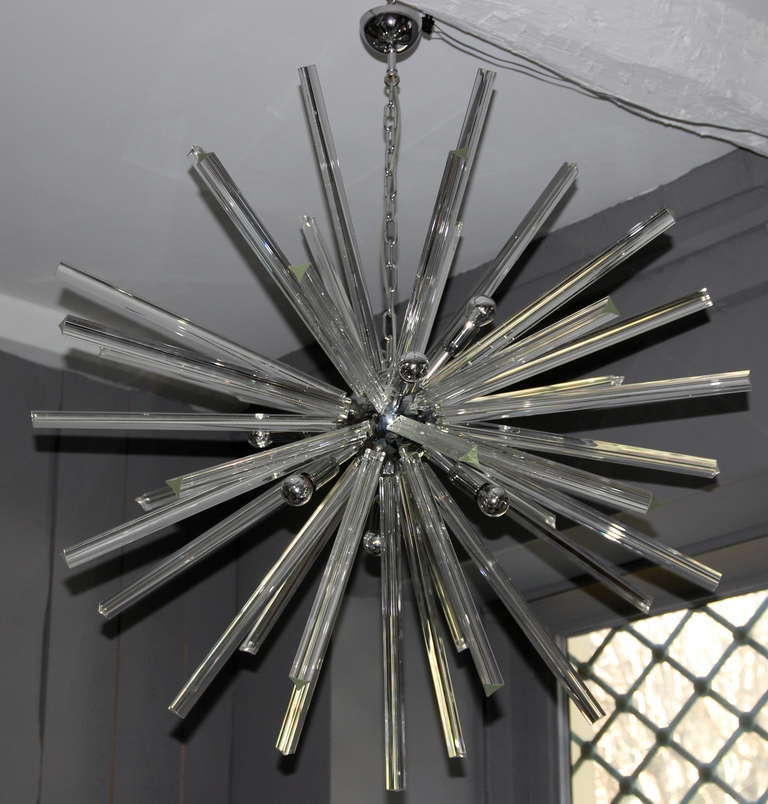 Pair of lusters, Glass and metal, circa 2000, Italy.
Height: 160 cm, diameter: 110 cm.