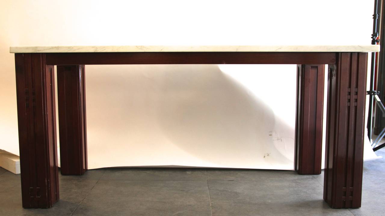 Console by Giorgetti,
mahogany and marble from Carrara,
Circa 1980, Italy.
Table measures:
Height: 72 cm, length: 154 cm, width: 71 cm.