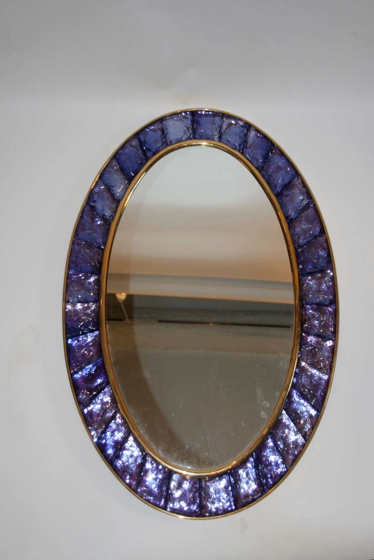 Ghiro, Made Brutalist Mirror, circa 2013, Italy, brass and glass,
Hand-chipped chunks of amethyst glass with polished brass mounts.
Height: 94 cm, diameter: 60 cm.