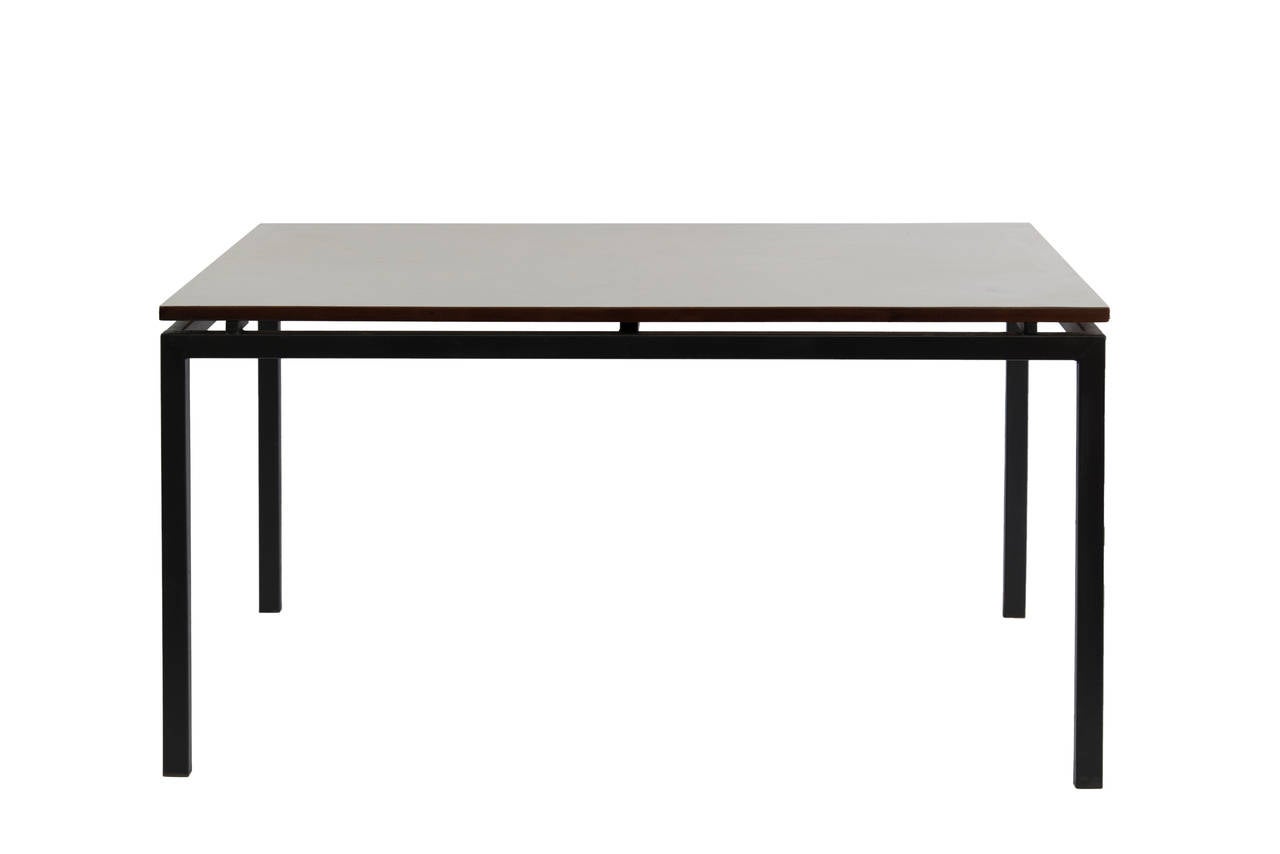 Charlotte Perriand, table designed for Cité Cansado, 
Mauritania, 1958, France.
Laminated oak, painted metal,
Steph Simon Edition.
Measures: Height 80 cm, length 140 cm, depth 75 cm.

Biography: Similar model:
Charlotte Perriand, 