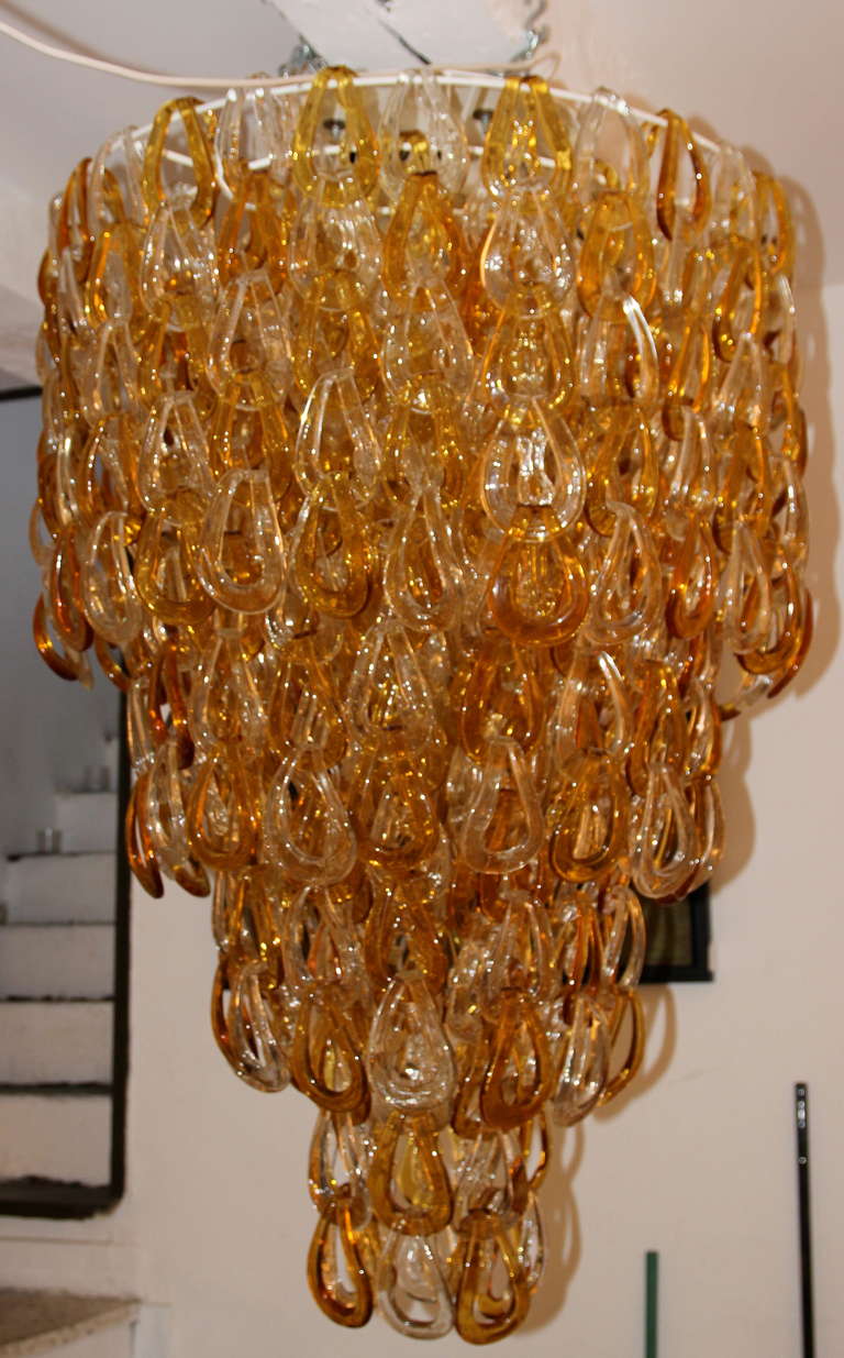 Mazzega style, Murano Glass chandelier,  Italy, circa 1980. 
Height: 1.50m, diameter: 85 cm.
