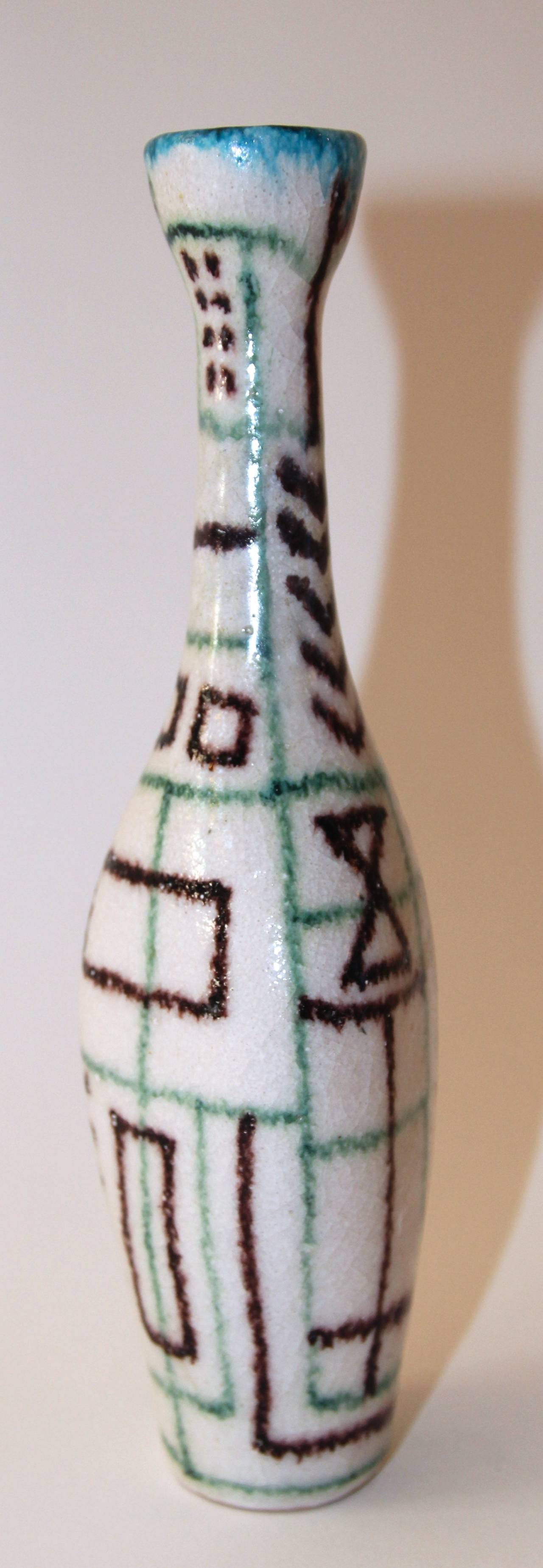 Guido Gambone (1909-1969), Bottle, 
Glazed earthenware,
Geometric decor, 
Signed and stamped: Gambone under the base, 
Italy, 1960.

Measures: Height 22 cm, diameter 3 cm.

Guido Gambone (1909 – 1969) is one of the most important and influential
