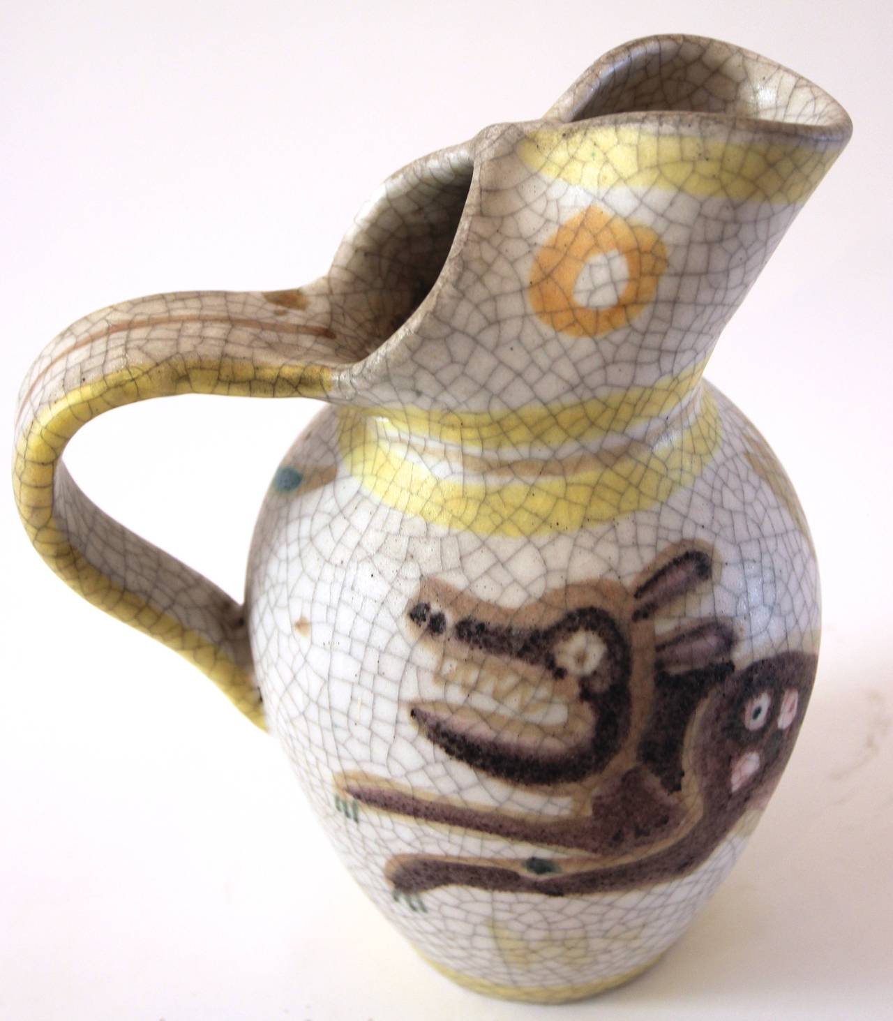 Guido Gambone,
Polychrome glazed earthenware pitcher,
Signed: Gambone,
circa 1960, Italy.
Measures: Height 26 cm, diameter 16 cm.