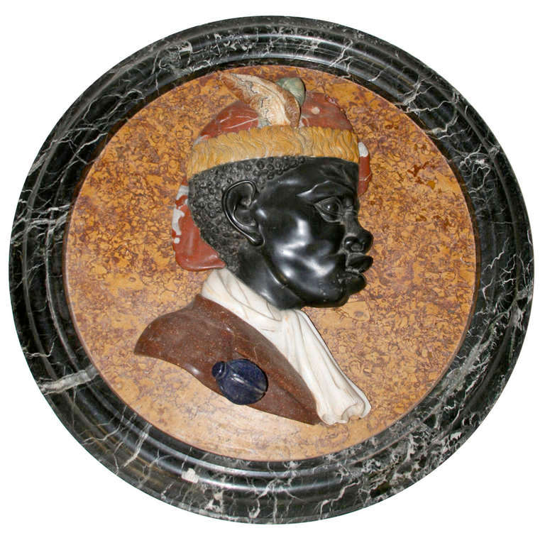 Pair of medallions depicting the profiles of a Moorish man and woman,
marble and carved stones,
Lapis lazuli, antique green and yellow, black Belgian, white Carrara,
Languedoc red, alabaster ribbon.
circa 2000, France.
Diameter: 78 cm, depth: 10 cm.