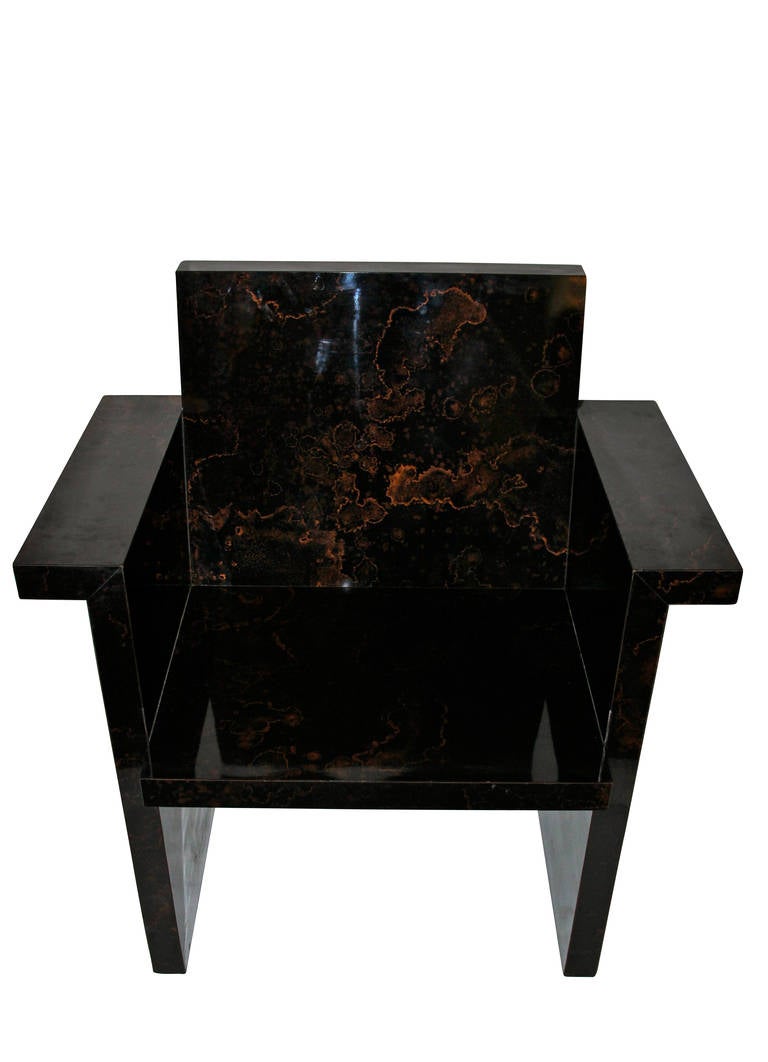 Pair of formica armchairs, 
Imitation of black marble, 
Slightly inclined backrest, solid sides,
Not signed, 
Circa 1970, France. 

Measures : Height: 92 cm, Seat height: 73 cm, Width: 62 cm, 
Depth: 52 cm, Length: 92 cm.