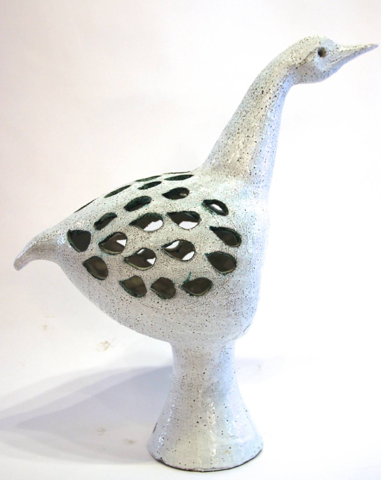 Glazed Ceramic bird Vallauris,
Signed Camos vallauris,
circa 1960, France.
Height: 52 cm, width 20 cm, depth: 48 cm.