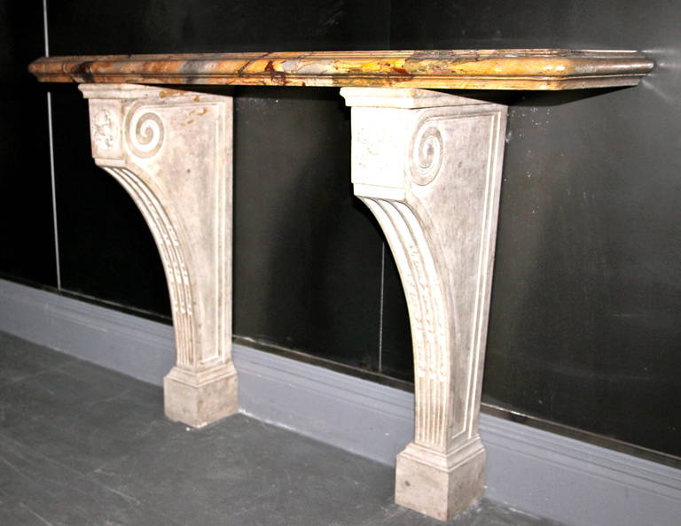 Pair of console tables, 
Sarracolin Marble sculpted, 
circa 1900, France.
Height: 87 cm, length: 125 cm, width: 37 cm, 
depth of the marble top:6 cm.
Vintage condition.