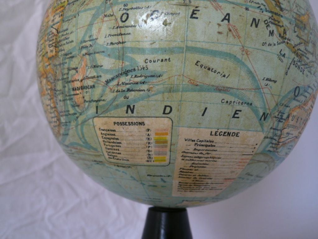 The old colonial empires and Russia of the Tsars are present, thus the globe at was manufactured before 1917.
Maker's trademark 
