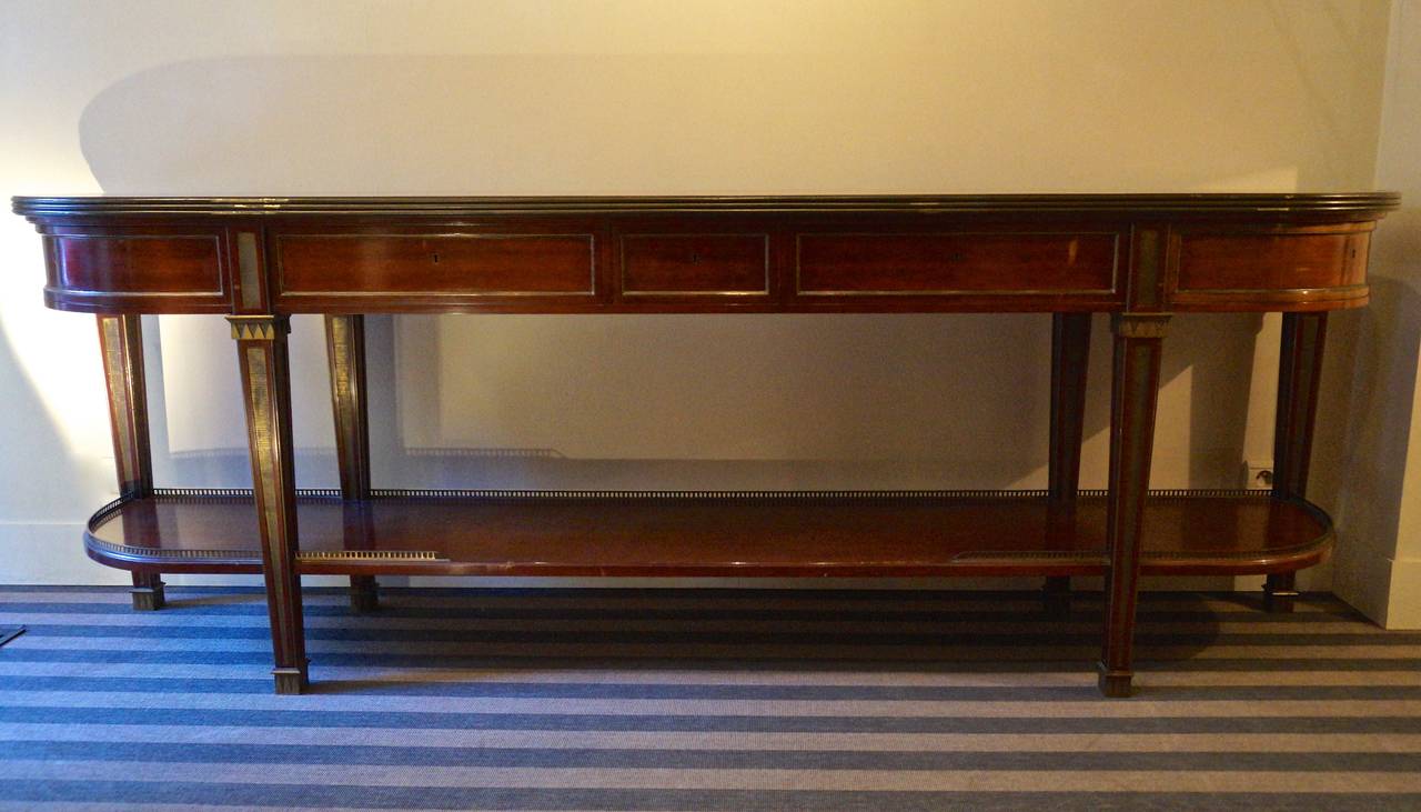 Large console table, five drawers,with bronze fittings and pierced bronze gallery.
Parquetry top in burr walnut.