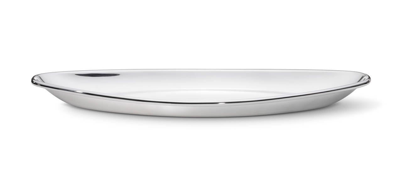 A monumental Georg Jensen lidded fish dish designed by 
Henning Koppel in year 1954.
Design #1026.

Dimensions:
Height 17cm / 6 2 ⁄3 inches.
Length 68cm / 26 7⁄9 inches.
Width 32cm / 12 3⁄5 inches.

The production of hollowware flourished