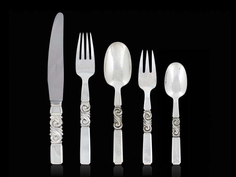 Sterling silverware set in Scroll/Saga #22. Designed by Johan Rohde in 1927. 

The set includes:

12 x Dinner Knife 8 7/8