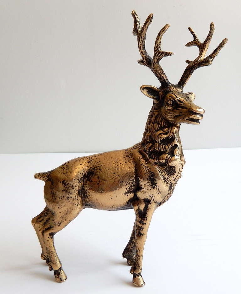 Beautifully sculpted cast deer by Gucci. Fine detailing and patina. Signed "Gucci, Made in Italy." 