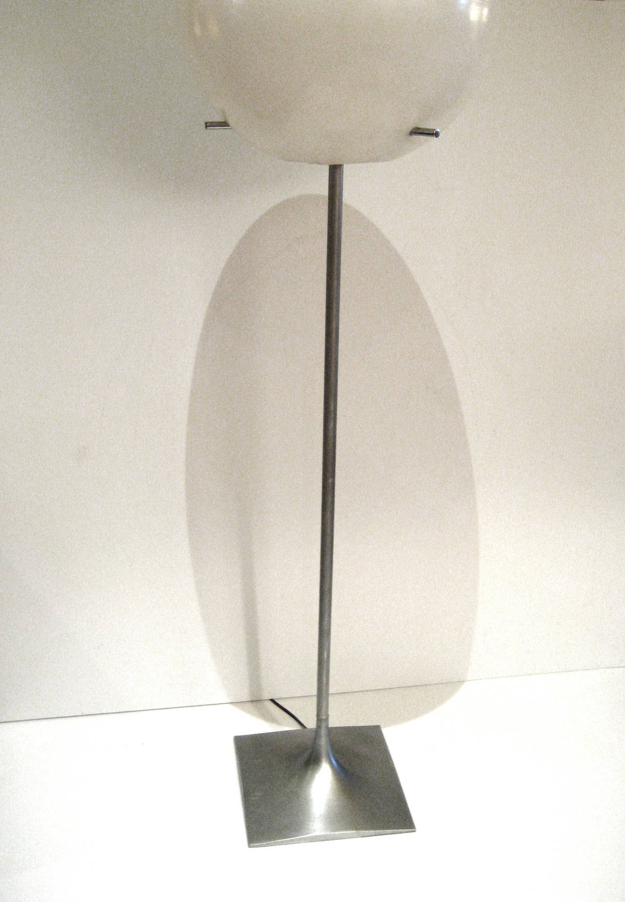 1970s large polypropylene globe, floor lamp designed by Paul Meyen for Habitat sitting on aluminum base with three chrome plugs holding the globe and push off/on switch.