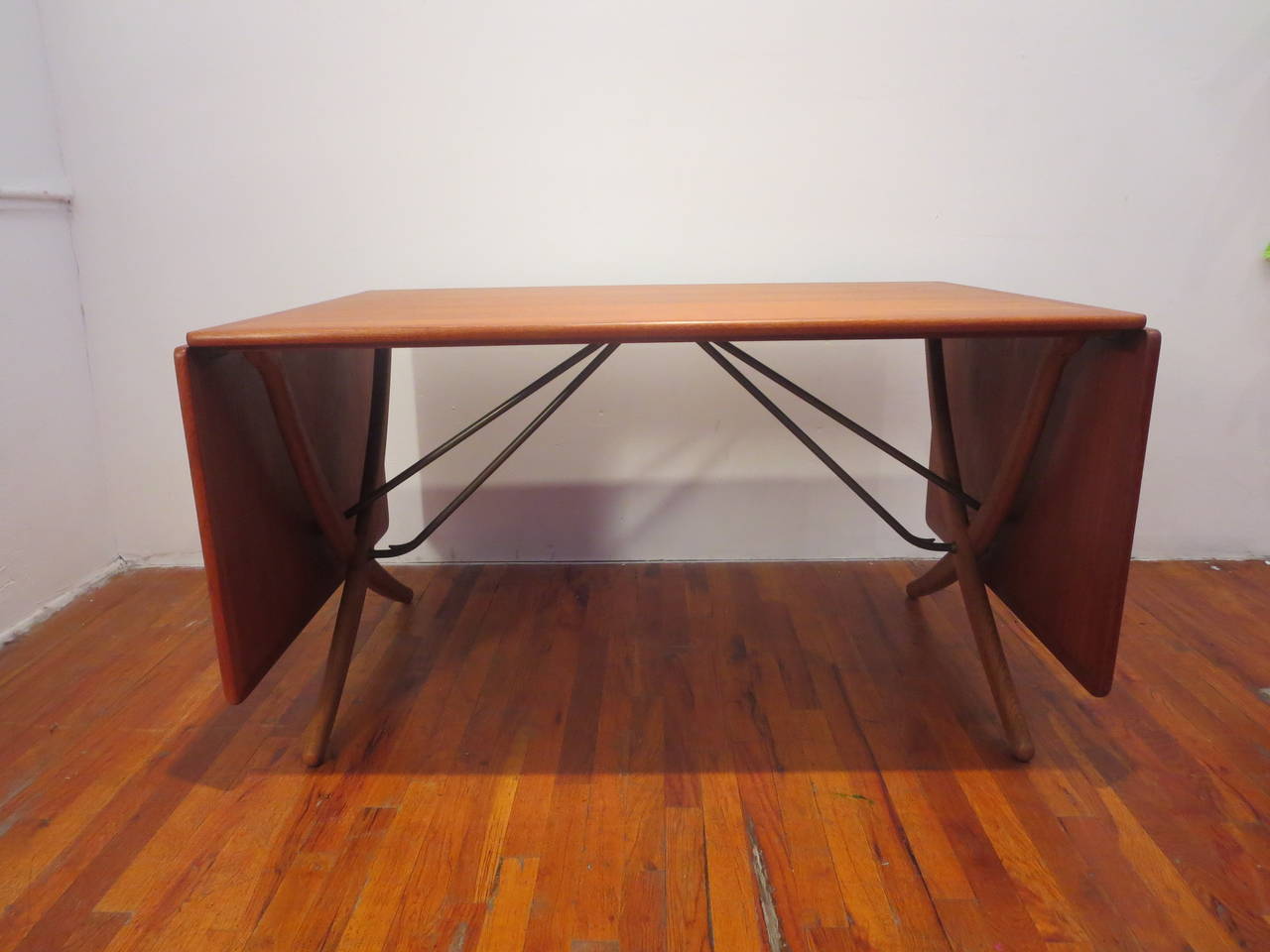 Beautiful Classic teak top dining table on oak crossed legs, by Hans Wegner for Andreas Tuck, great condition table top its been professionally refinished, its 50 1/2