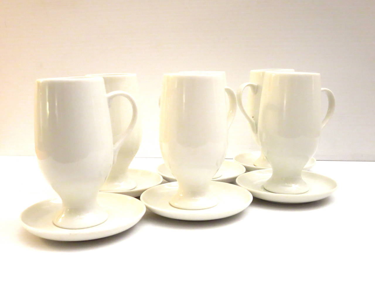 New old stock set of 6 Espresso capuccino cups and saucers in white porcelain designed by Lagardo Tackett for Schmid, in white porcelain made in Japan circa 50s, condition its like new never used the box its missing the top , no chips or cracks ,