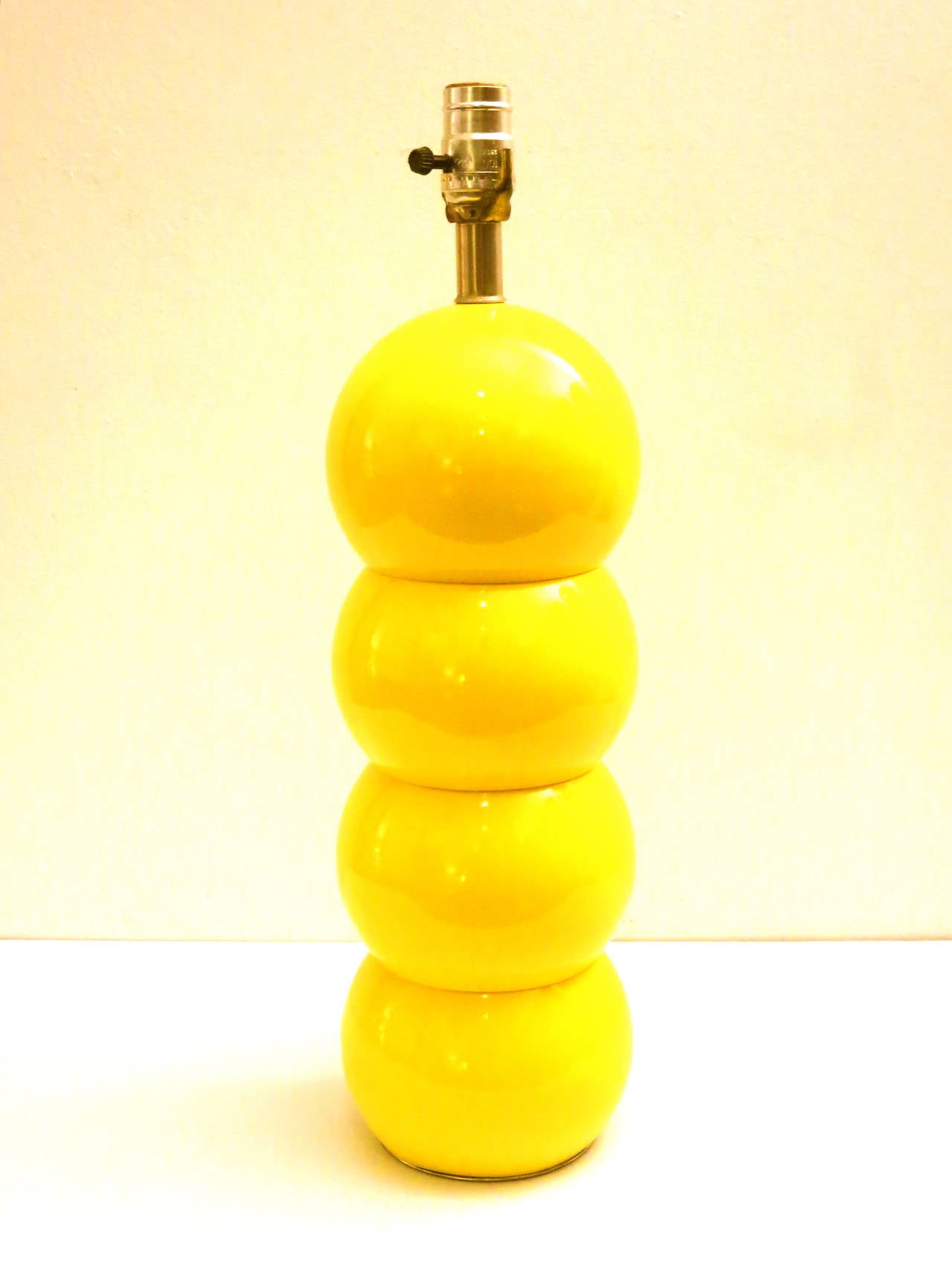 A one of a kind 1960s metal ball stacked table lamp, designed by George Kovaks, the lamp has been rewired and each metal ball sand blasted and powder coated in stricking yellow, beautiful and elegant piece 21