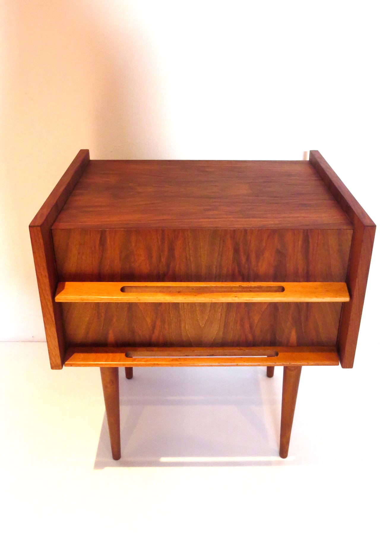 One of a kind single nightstand designed by Edmond Spence, circa 1950s, in walnut oiled finish with solid birch handles, rare finish all in good condition with a couple of marks on the left lower side as shown on the picture nothing major but needs